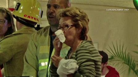 A woman covers her face after guests were evacuated from the La Quinta Inn and Suits near LAX on Saturday, Oct. 06, 2012.