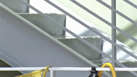 Water rushes over a staircase at a research building at Childrens Hospital Los Angeles on Sunday, Oct. 7, 2012.