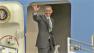 President Barack Obama waves before boarding Air Force One at Los Angeles International Airport on Monday, Oct. 8, 2012.