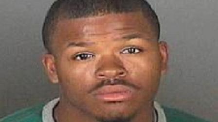 Christopher Smith, 21, was arrested on kidnapping and grand theft auto charges in Lawndale Tuesday.
