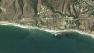 A Google Maps image shows the 25000 block of Pacific Coast Highway in Malibu.