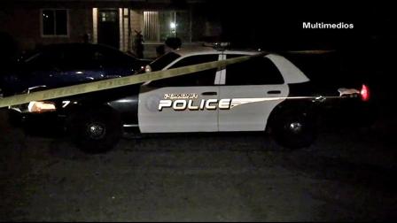 A Pomona police patrol vehicle is shown near the scene of a fatal shooting in the 900 block of Capper Avenue in Pomona on Tuesday, Oct. 16, 2012.