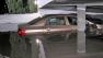 A car is shown submerged under water in an apartment complex garage in West Hollywood on Wednesday, Oct. 24, 2012.
