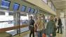 Travelers at LAX check for delays and cancellations on Monday, Oct. 29, 2012.