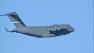 A plane is seen in the air near March Air Reserve Base on Sunday, Nov. 4, 2012. Planes were sent from the base to aid in the Superstorm Sandy relief effort.