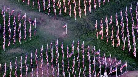 Flags honoring Americas veterans are seen on display at Sierra Vista Middle School in Covina on Monday, Nov. 12, 2012. The display of 2,001 flags is courtesy of the Rotary Clubs Field of Valor.