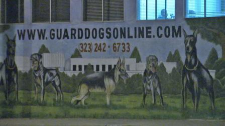 The sign for J.R. Ewing Guard Dogs, located on the 1200 block of El Segundo Boulevard, is shown in this undated file photo.