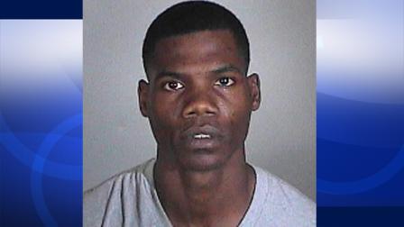 Aaron Robinson, 32, seen in this booking photo, is accused of raping a woman at his Hawthorne apartment. Police said Robinson met the alleged victim on an online dating website.
