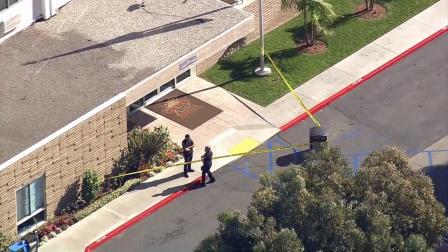 Police investigate a shooting in a high-rise senior citizen complex in Torrance on Tuesday, Nov. 20, 2012.