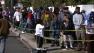 People stand in line at the annual Jackson Limousine Turkey Giveaway on Tuesday, Nov. 20, 2012.
