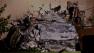 A mangled car is pulled out of a Long Beach church after having slammed into it Wednesday, Nov. 28, 2012.
