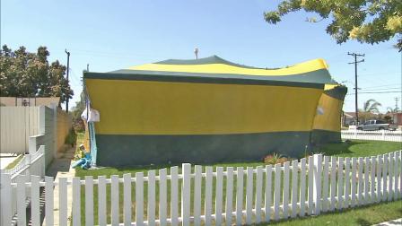 A house tented for fumigation is seen.