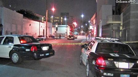 Police responded to a deadly robbery near San Julian and Sixth streets in downtown Los Angeles Monday, Dec. 3, 2012.