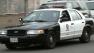 An LAPD officer patrols a West Valley neighborhood on Friday, Dec. 14, 2012.