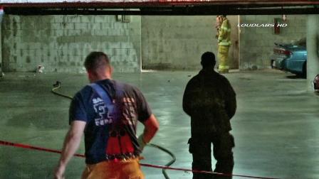 Firefighters are seen investigating an underground parking garage in Santa Monica where a homemade explosive device went off on Monday, Dec. 17, 2012. No one was injured in the explosion and no damage was caused.