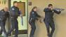 Law enforcement officials participate in a campus safety drill at California State University, Northridge on Thursday, Dec. 20, 2012.