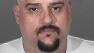 Michael Wieczorek, 42, was arrested for allegedly stealing a package off a porch of a Rancho Palos Verdes home. Investigators also found identity theft materials during a search of his home in San Pedro.
