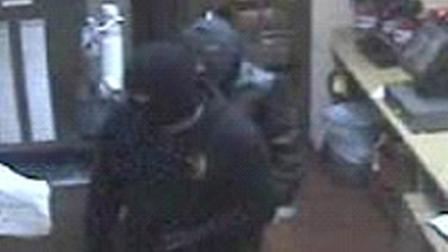 A search is under way for three male suspects responsible for robbing a Jack in the Box in Santa Monica at knife point Tuesday, Dec. 18, 2012. The suspects fled in a late model gold colored Chevrolet Suburban.