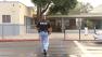 A police officer arrives at a Los Angeles school in this undated file photo.