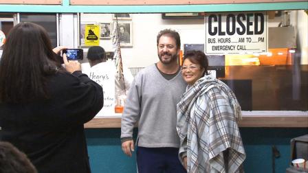 Fans of Henrys Tacos take a photo in front of the Studio City eatery on Saturday, Jan. 12, 2013, the night it closed after 51 years in business.