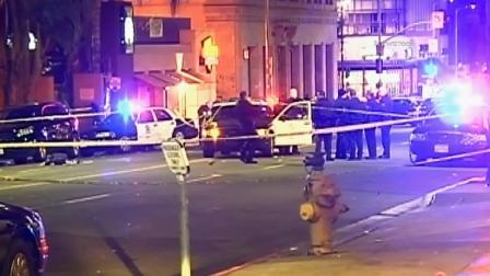 Los Angeles police officers respond to the scene of a shooting outside of Empire located on the 1700 block of North Cahuenga Boulevard on Sunday, Jan. 13, 2013.