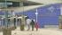 Long Beach residents make best of rain :: Visitors are seen outside the Aquarium of the Pacific in Long Beach in this undated file photo.