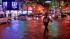 Angelinos out and about in LA rain :: A woman is seen walking in Burbank on Friday, Jan. 25, 2013.