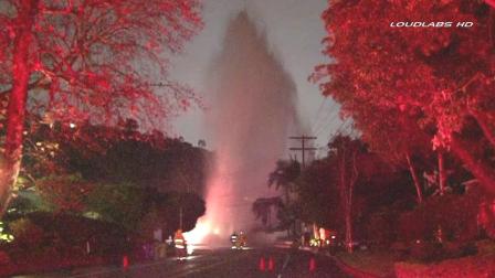 A car slammed into a fire hydrant in Beverly Hills, sending up hundreds of feet into the air on Benedict Canyon Road near Clear View Drive on Friday, Jan. 25, 2013.