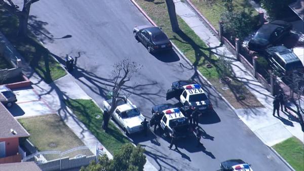 A pursuit comes to an end in a Panorama City neighborhood. Officers are seen waiting for the suspect to get out of his vehicle.