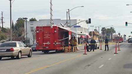 Fire officials are shown at the location of an ammonia leak in the 600 block of West Anaheim Street in Long Beach on Saturday, Feb. 2, 2013.
