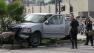 Officers are seen investigating the scene of a crash after an alleged car thief slammed head-on into a pole on Sherman Way in Winnetka while evading police on Saturday, Feb. 2, 2013.
