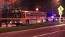 An MTA bus is parked at the scene of an accident in West Hollywood, where two pedestrians were struck on Monday, Feb. 4, 2013.