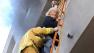 LAFD crews rescued two residents trapped on a balcony, while a third was taken to the hospital with non-life threatening injuries related to smoke exposure Wed., Feb. 13, 2013.