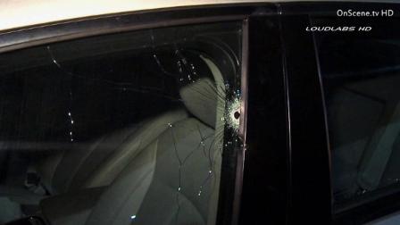 A woman was shot in the back after she fled away in her vehicle from an attempted carjacking at the intersection of Pico and Redondo boulevards in the Mid-Wilshire District of Los Angeles Sunday, Feb. 17, 2013.