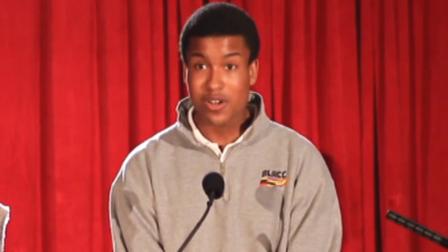 Harvard-Westlake School student Justin Carr introduces a guest speaker at a school event in this still image from the schools website.