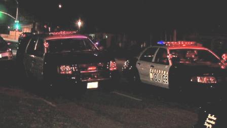 Pasadena police patrol cars are shown near the scene of a deadly shooting in the 600 block of Mar Vista Avenue on Thursday, Feb. 28, 2013.