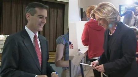 Councilman Eric Garcetti and City Controller Wendy Greuel are seen voting on Tuesday, March 5, 2013.