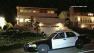 A patrol vehicle is shown parked outside of a house in Rancho Palos Verdes, where two men held a family of three captive while ransacking the house on Tuesday, March 12, 2013.
