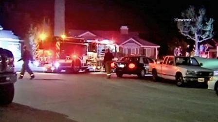 A fire engine is shown near the scene where a gardener was found dead at the bottom of a swimming pool in the 10900 block of Meseta Avenue called authorities on Tuesday, March 27, 2013.
