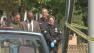 Investigators are seen on Thursday, March 28, 2013, near the Northridge home where a young girl was abducted. She was found about 10 hours later.