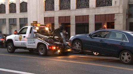 A man was arrested after leaving his young child locked in his car in Hollywood, then reporting the car missing on Saturday, March 30, 2013.