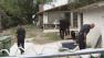 Los Angeles police on Monday, April 1, 2013, investigate a home in the 18200 block of Rayen Street in Northridge, where a suspect was taken into custody a day prior in connection with the kidnapping of a 10-year-old girl.