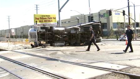 At least 13 people were hurt when a Metrolink train collided with a dump truck in Pacoima on Saturday, April 6, 2013.