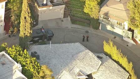 Law enforcement officials are shown in the 2500 block of Hargrave Drive in Hollywood, the scene of a SWAT standoff on Wednesday, April 17, 2013.