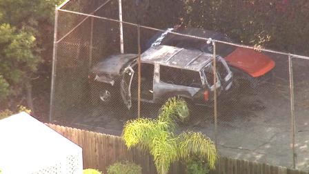 Homicide detectives were working to determine whose charred remains were discovered in a burned-out SUV in Rancho Palos Verdes on Tuesday, April 23, 2013.
