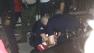 Los Angeles police officers apprehend a partygoer at a USC house party early Saturday, May 4, 2013.