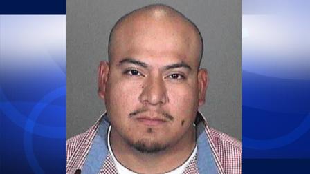Juan Peralta, 31, is shown in a booking photo. Peralta was taken into custody for allegedly driving drunk with his two children in the car, and six empty beer cans hidden in a diaper bag.