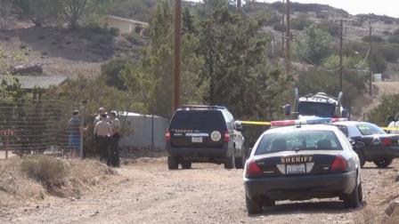 Los Angeles County Sheriffs Department patrol cars are shown near the scene of a fatal shooting in Acton.