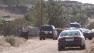 Los Angeles County Sheriffs Department patrol cars are shown near the scene of a fatal shooting in Acton.