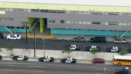Police respond to West Adams Prep High School in Los Angeles on Thursday, May 16, 2013.